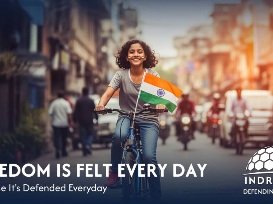 Child riding a bicycle on a busy street, holding the Indian flag, symbolizing freedom and national pride.
